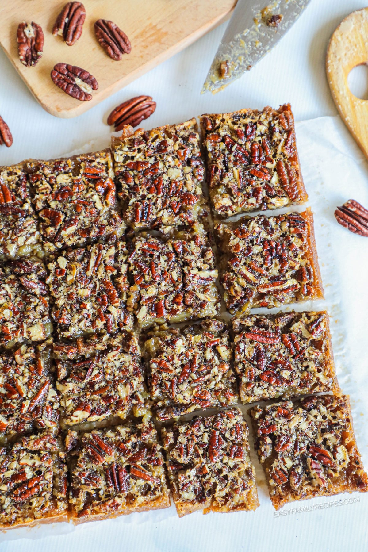 overhead of Southern pecan pie bars sliced into squares.