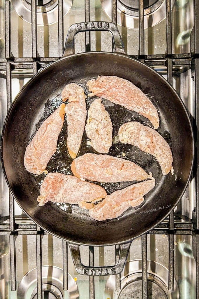 How to make Lemon Pepper Chicken Tenders Step 3: Cook the chicken tenders in a hot skillet.