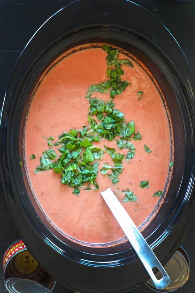 How to make tomato basil soup in a crockpot step 3: Cook. Then stir in heavy cream and fresh basil.