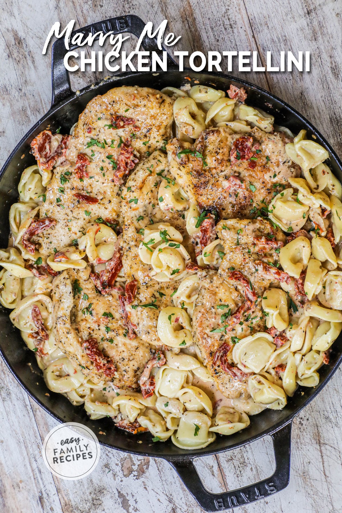 Overhead view of marry me chicken tortellini in a cast iron skillet