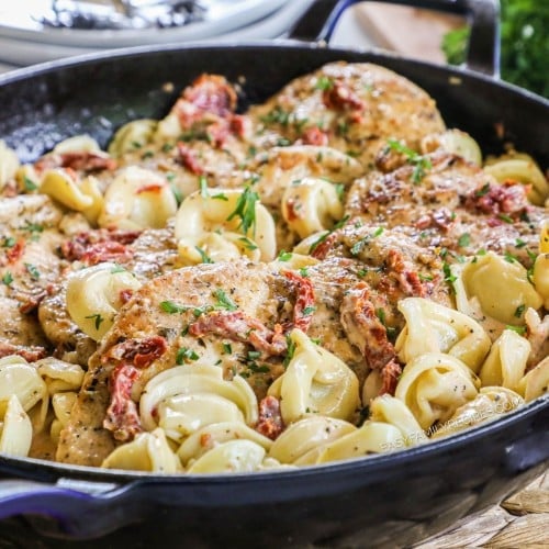 Skillet of marry me chicken and tortellini