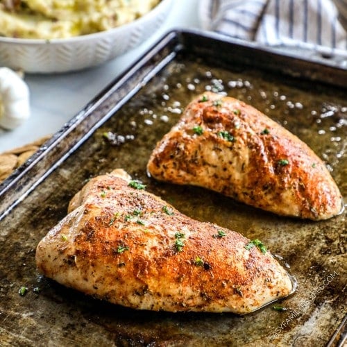 Two turkey tenderloins that have been roasted on a pan