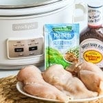 ingredients for slow cooker bbq chicken sliders next to a crockpot.