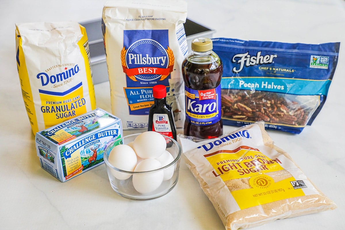 ingredients for shortbread pecan pie bars.