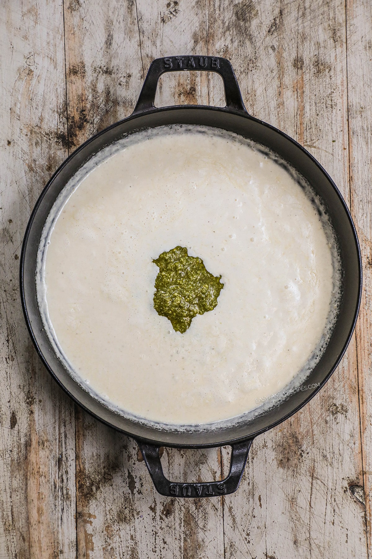 step 2 - Whisk the broth into flour until smooth and simmering, then slowly whisk in the cream and return to a simmer.