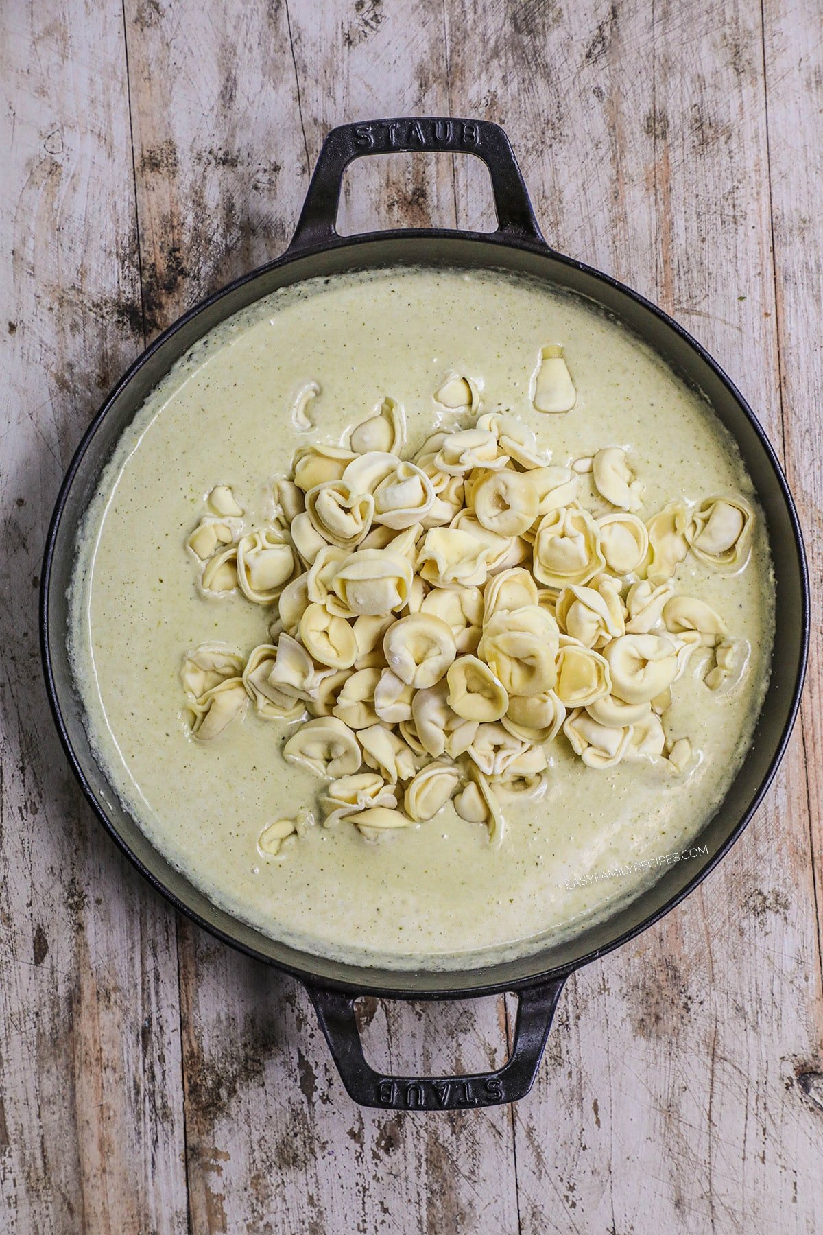 step 3 - Stir in the pesto and parmesan cheese