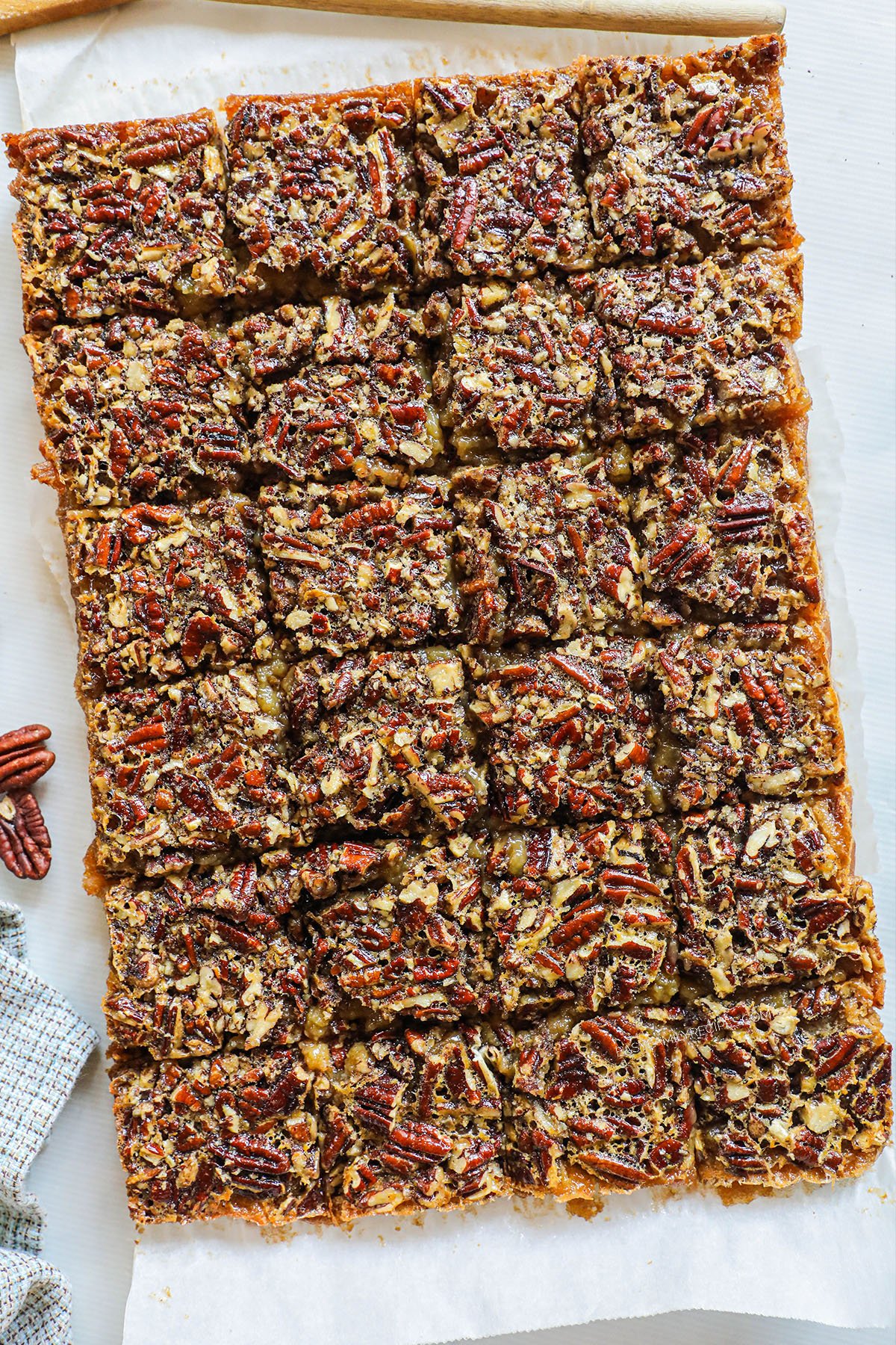 Finished overhead of Southern pecan pie bars sliced into squares.