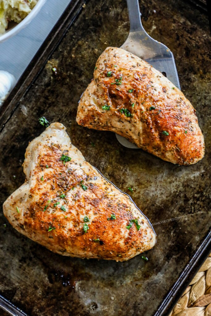 Turkey tenderloin on a baking sheet.