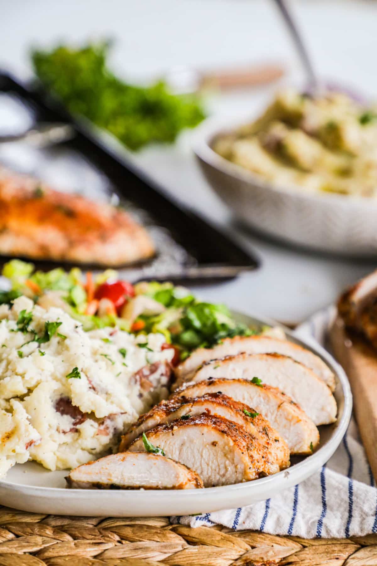 Turkey Tenderloin served with mashed potatoes for Thanksgiving.