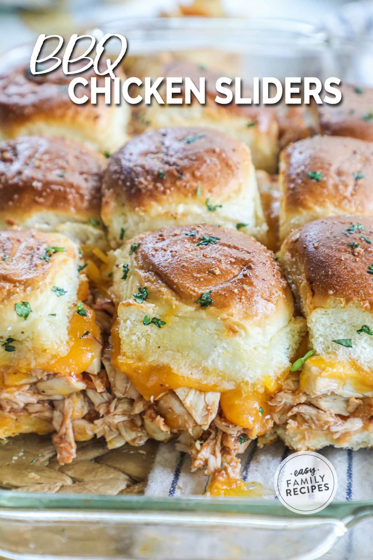 Baking dish of pulled BBQ chicken sliders