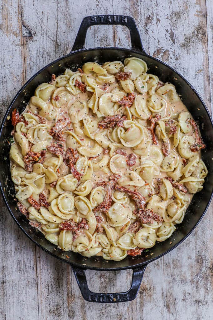 How to make Marry me chicken and tortellini step 4: add tortellini into Marry me chicken sauce to simmer until tender.