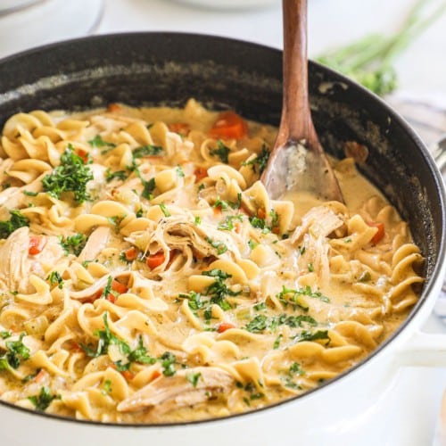 a large pot of creamy chicken noodle soup.