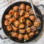 Overhead view of firecracker chicken meatballs in skillet