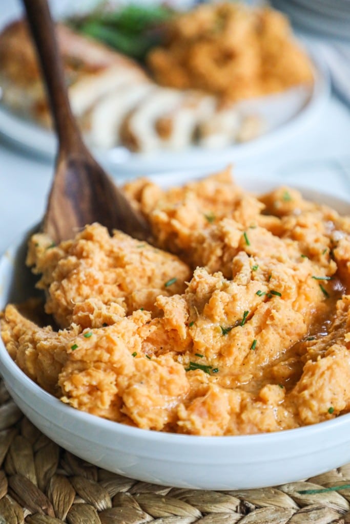 Mashed Sweet Potatoes in a serving bowl to serve for dinner with chicken wings