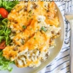 Ground beef hashbrown casserole served on a white plate
