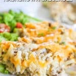 Ground beef hashbrown casserole served on a white plate