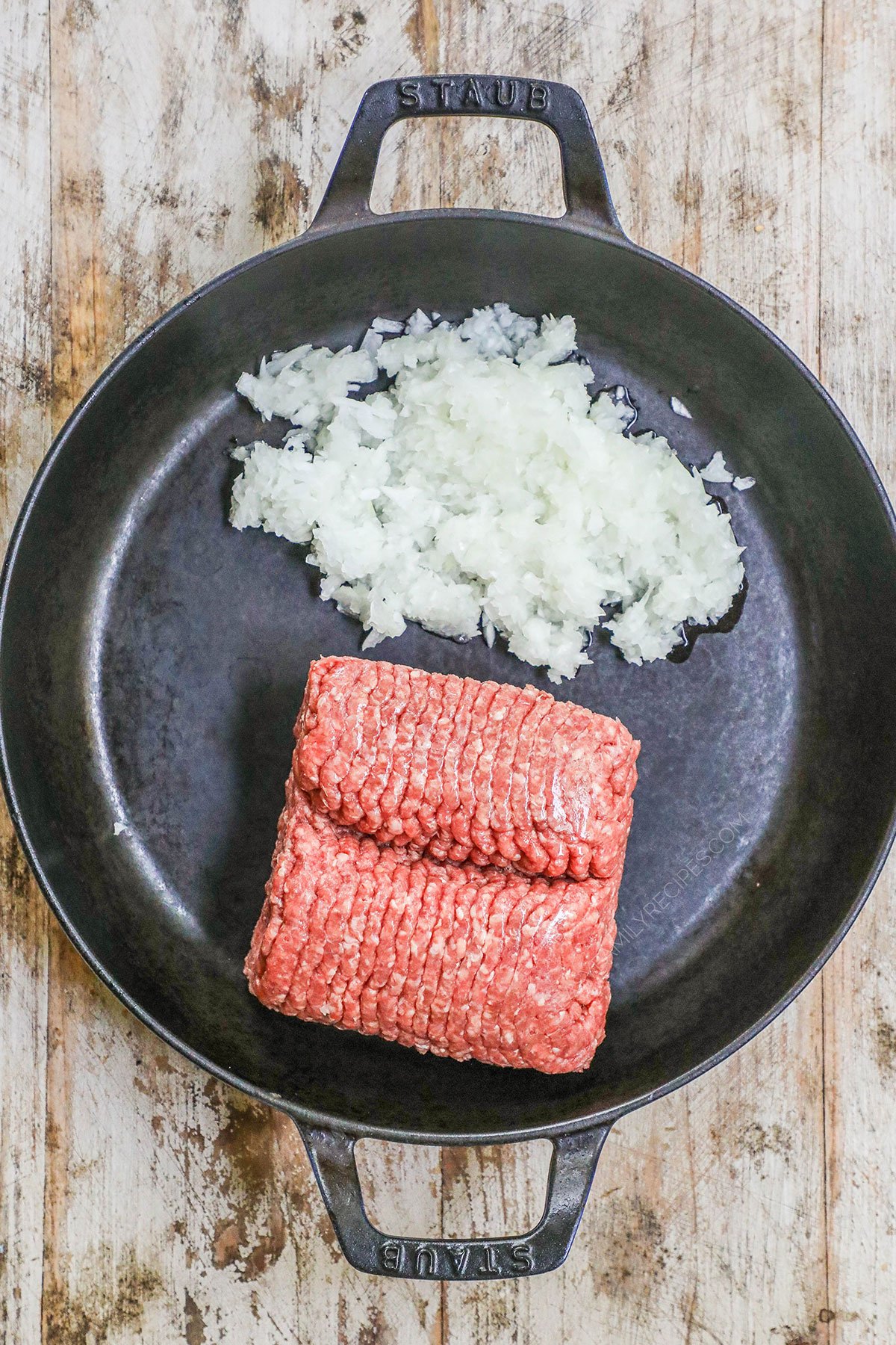 How to make ground beef hashbrown casserole: 1) brown the beef and onion