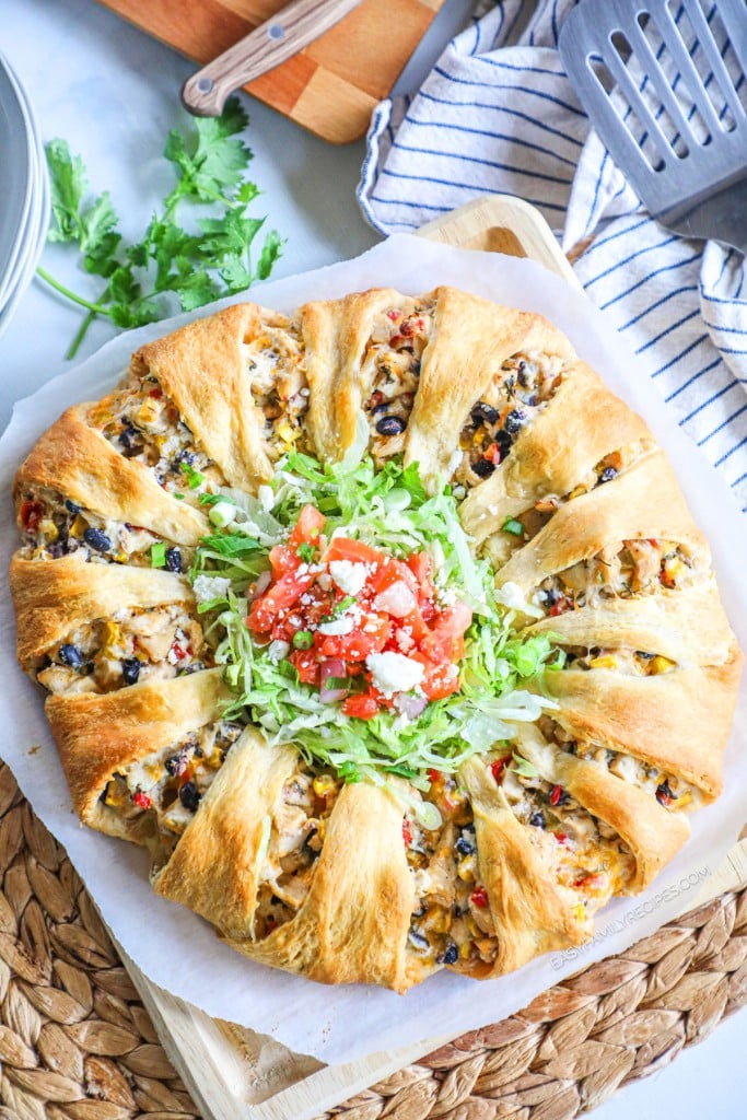 Easy Taco Crescent Ring served with lettuce and pico de gallo