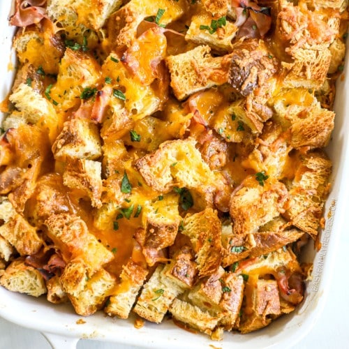 Overhead view of Ham & Cheese Croissant Breakfast Casserole in dish