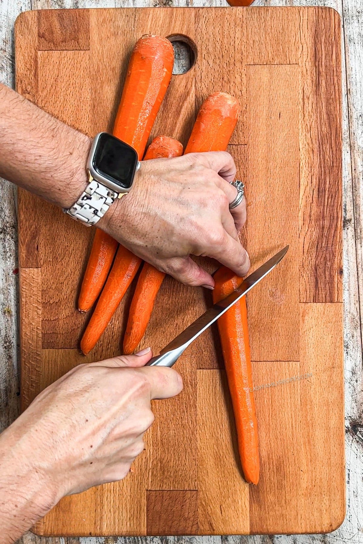 Step 1 for maple glazed carrots. Cutting carrots