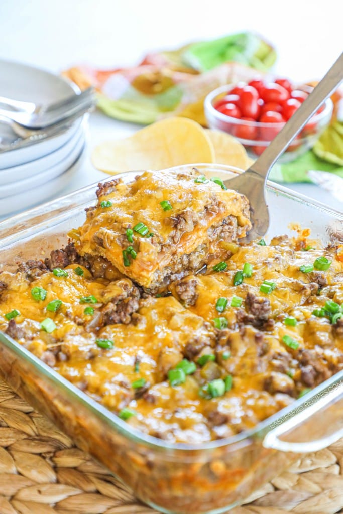taco lasagna made with leftover taco meat in casserole dish