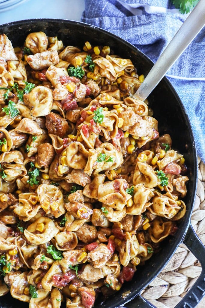 Taco pasta in a skillet made with leftover taco meat