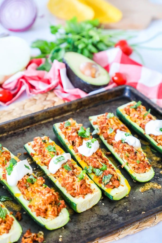 Zucchini stuffed with leftover taco meat and cheese