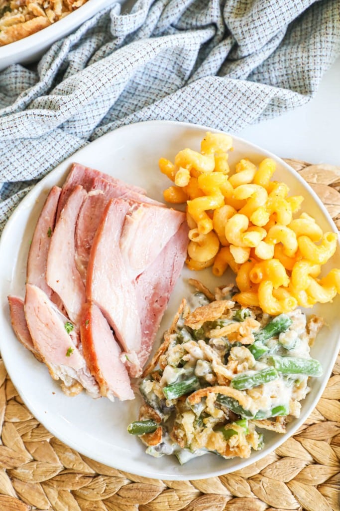Christmas Ham Dinner plate with ham, macaroni and cheese, and green bean casserole