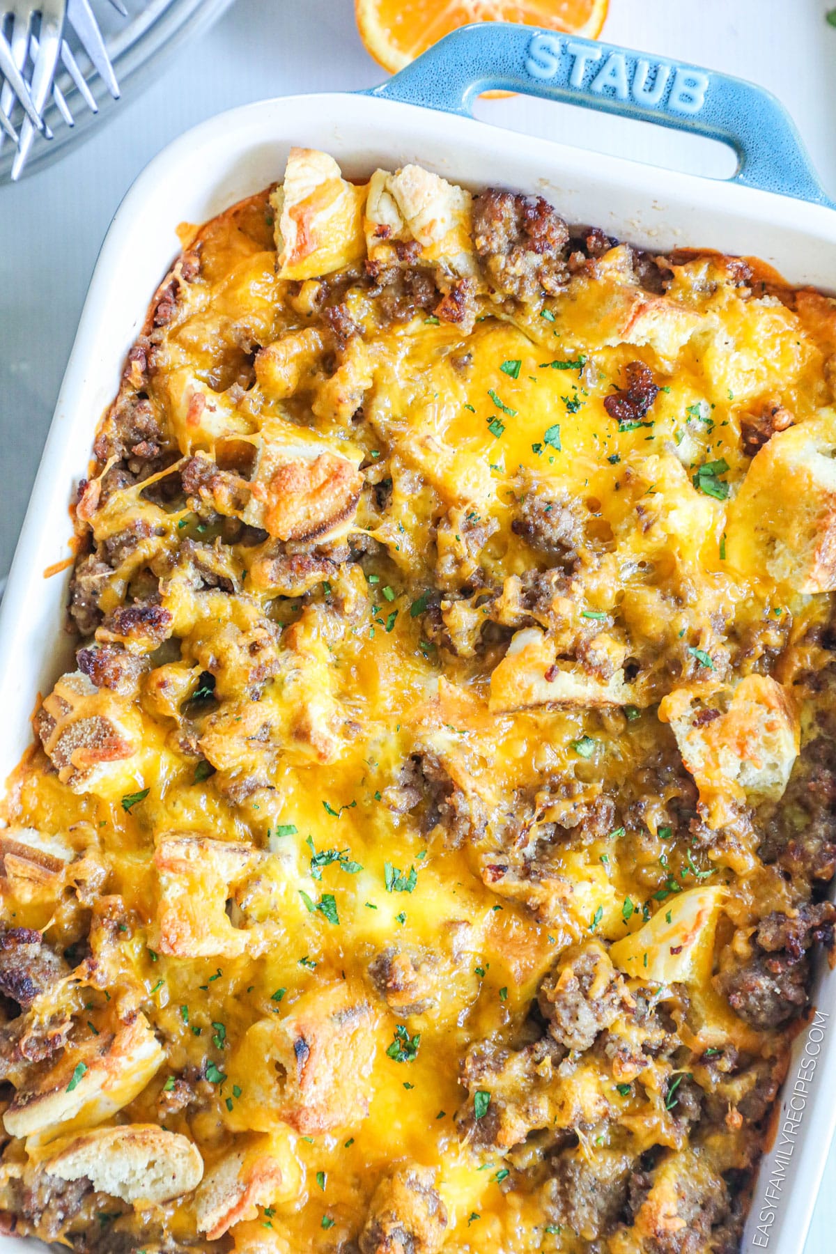 overhead of a sausage mcmuffin breakfast casserole in a baking dish.