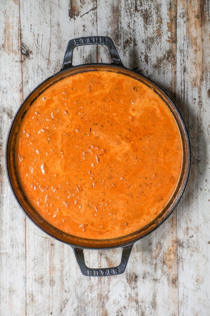 Overhead view of creamy chorizo sauce in skillet