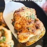 Mexican chicken thigh being lifted from skillet with spatula