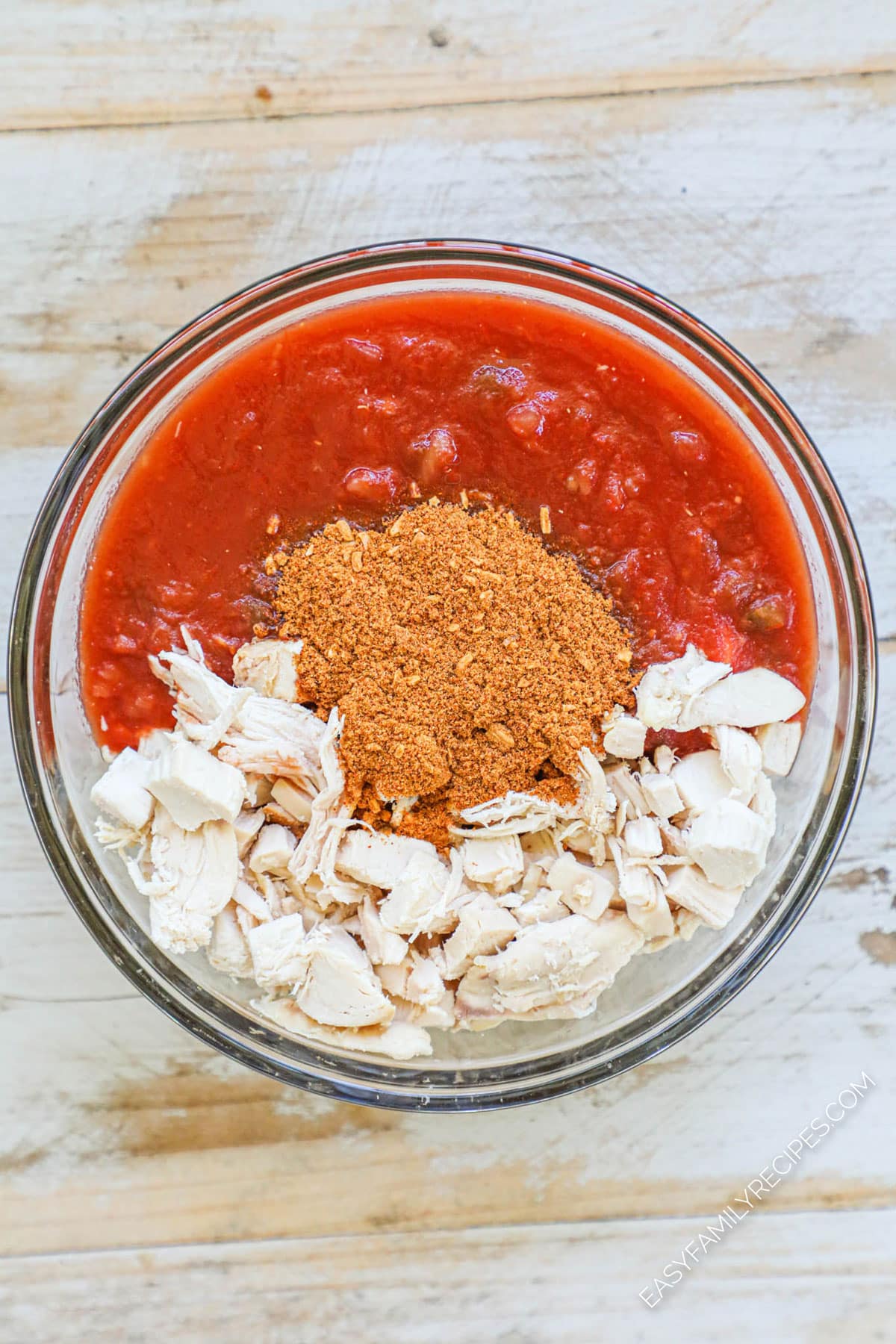 Step 1 How to make chicken taco casserole mix chicken with salsa and taco seasoning