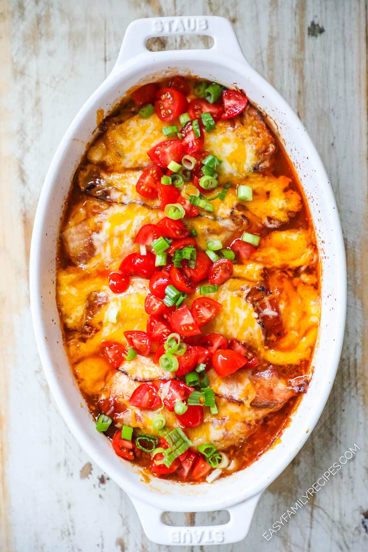 Process photos for how to make Monterey Chicken Step 4: Bake until chicken is cooked through and top with tomatoes and onions