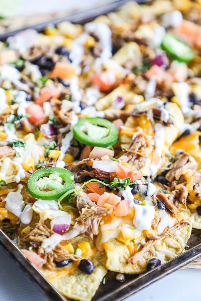 Nachos on a pan with chili and your favorite toppings