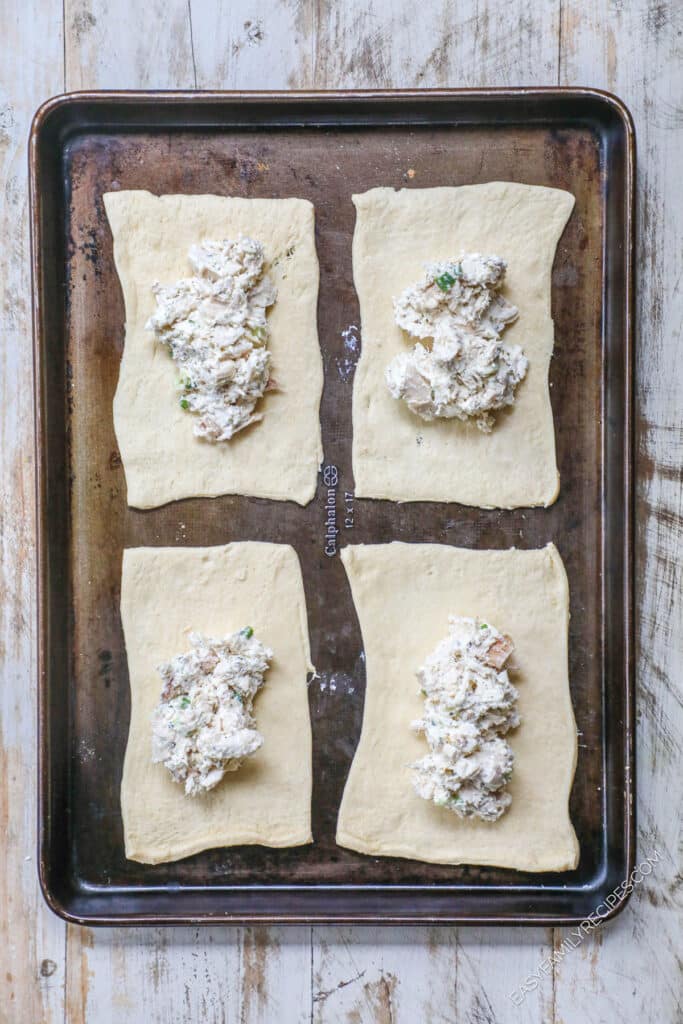 How to Make Chicken Pillows Step 2: Add creamy chicken mixture to the center of pillsbury crescent rolls.
