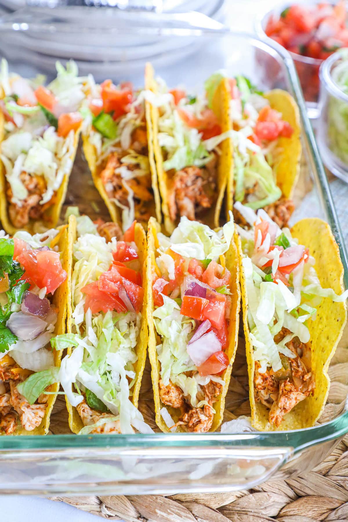 baked chicken tacos in a glass dish