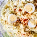 Southern potato salad recipe in a bowl with text "Deviled Egg Potato Salad".