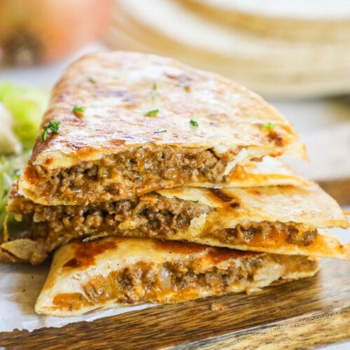 three slices of beef quesadilla stacked.