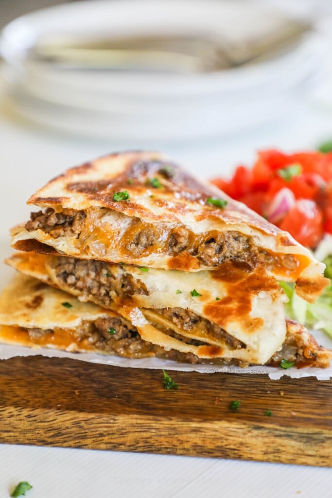 three slices of beef quesadilla stacked.