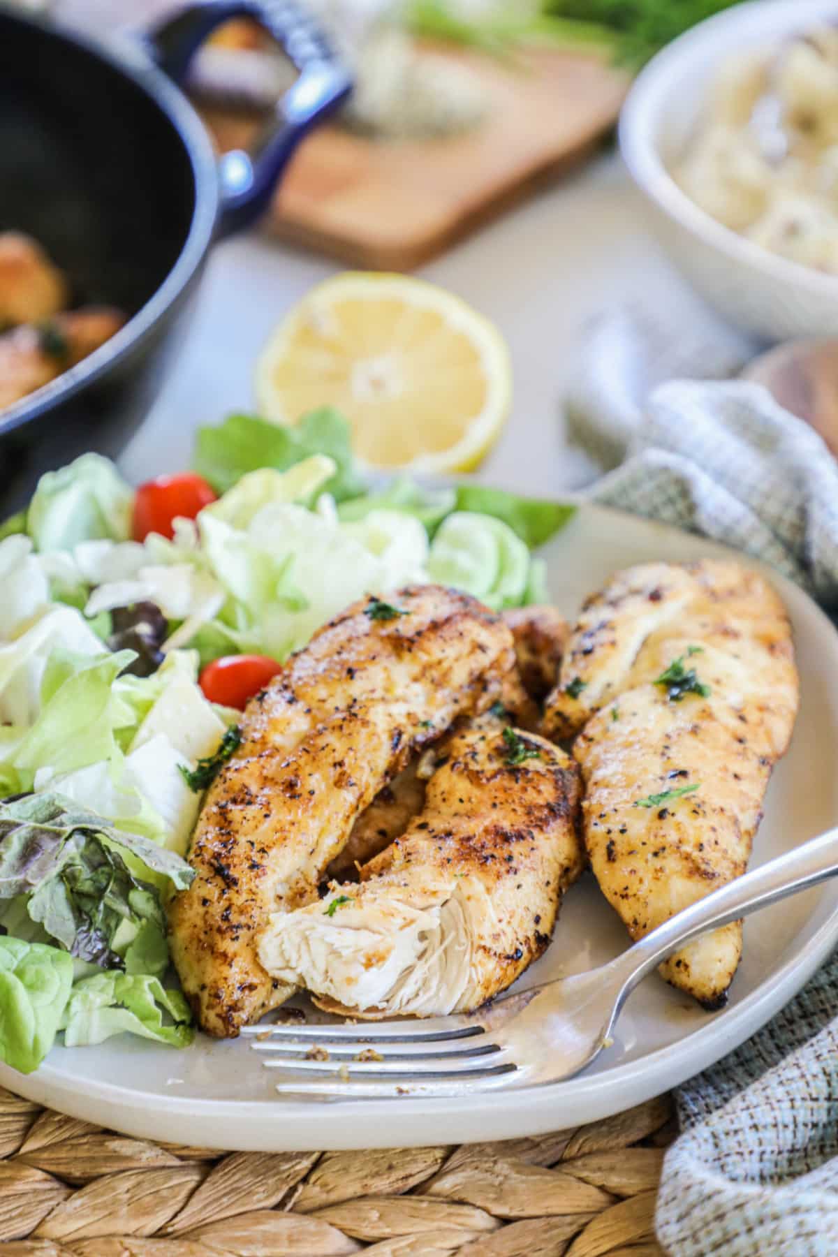 Healthy lemon pepper chicken with a side salad