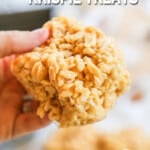 A hand holding a Salted Caramel Rice Krispie Treat with the text "salted caramel Krispie treats"