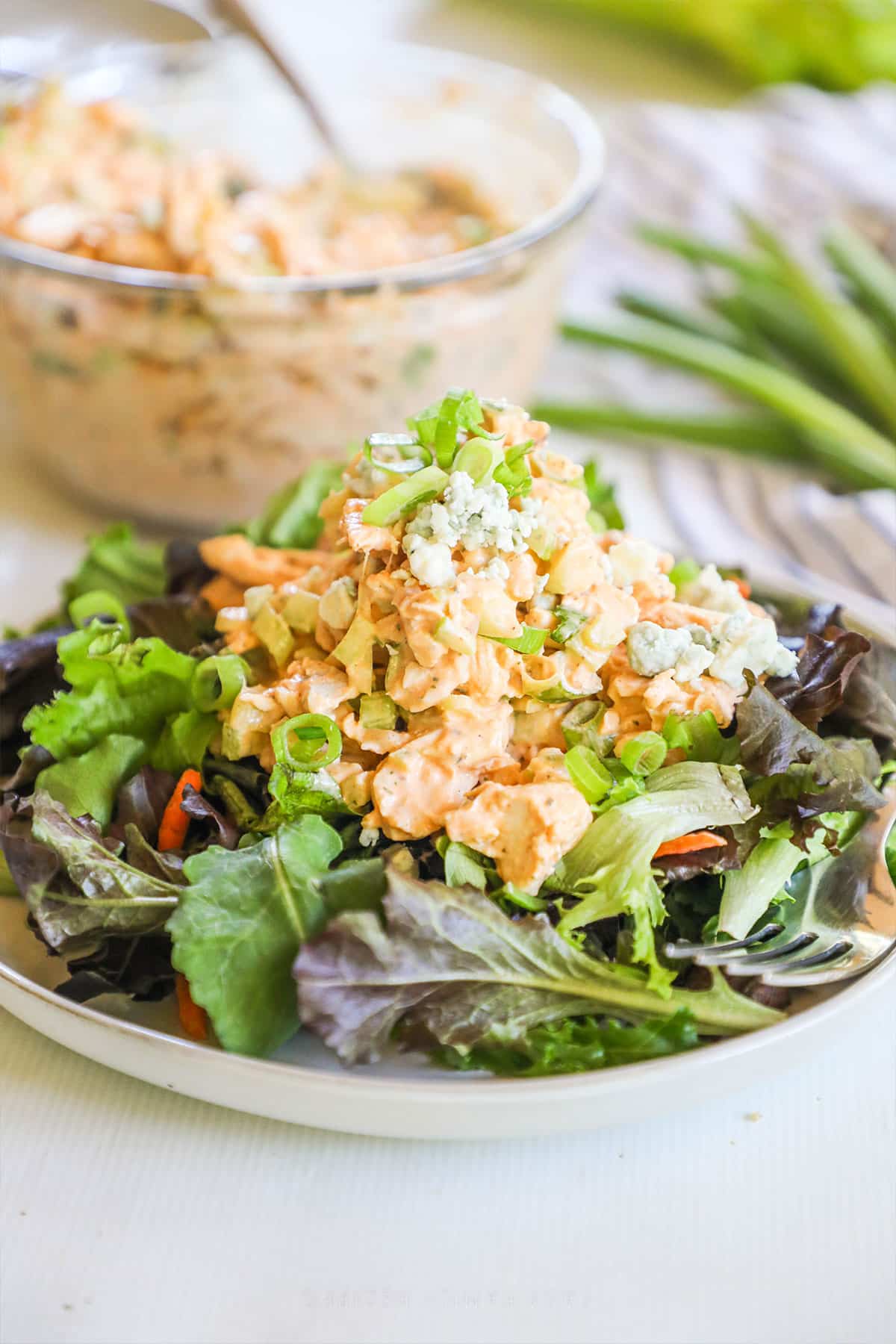 buffalo chicken salad, topped with blue cheese crumbles