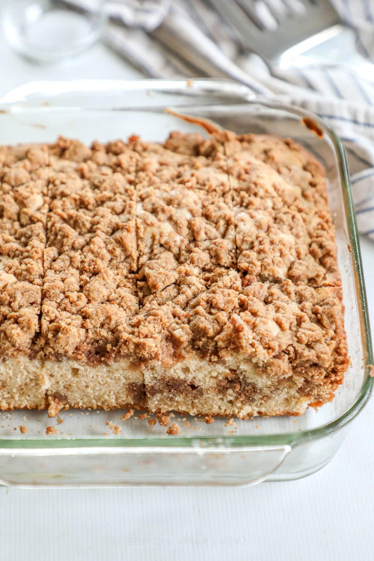 Cinnamon crumble coffee cake in a baking pan, ready to serve. 