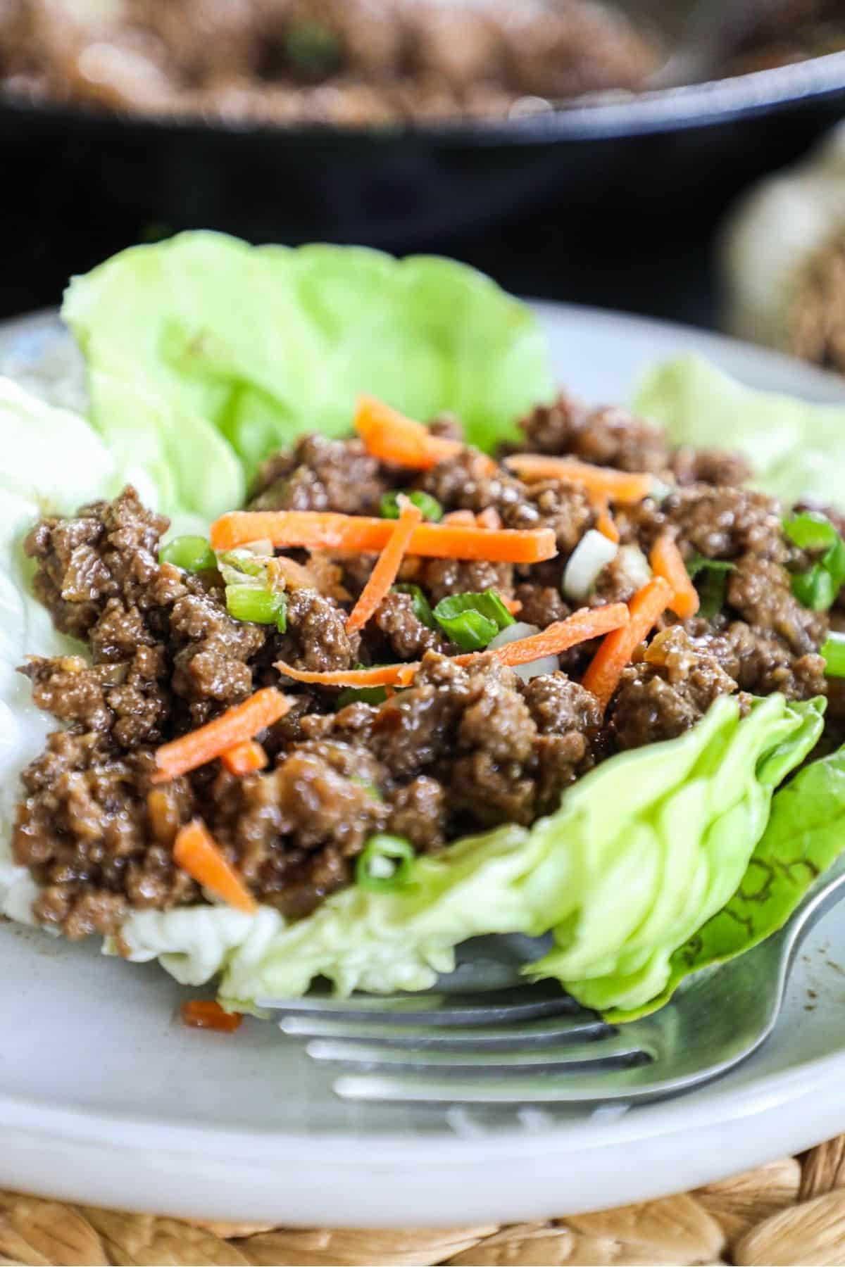 ground beef lettuce cups with carrots on top