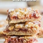 Closeup of strawberry crumb bars topped with glaze