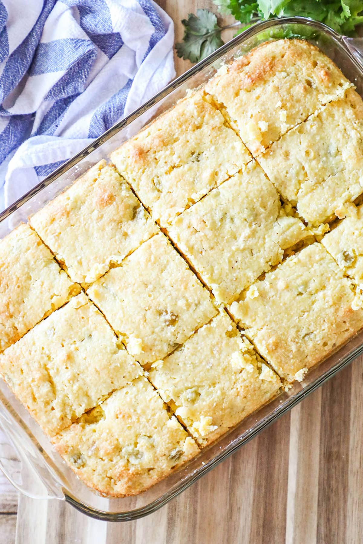 Mexican cornbread recipe sliced in glass baking dish