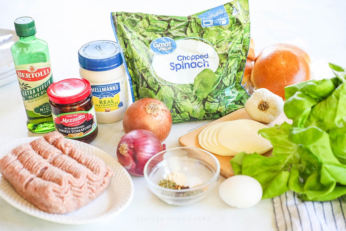 Ingredients for Turkey Burgers 0 sundried tomatoes, ground turkey, lettuce, spinach, seasonings and cheese 