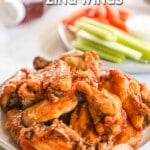 A plate full of Asian Zing Wings, ready to be served. The text reads, "Asian Zing Wings."