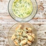 A four-image collage showing slow cooker garlic Parmesan wings being made. The first image shows the wings in the Crock Pot, the second image shows the ingredients for coating the wings, the third image shows the wings being coated, and the fourth image shows the wings lined up on a baking sheet, ready to crisp up before serving.