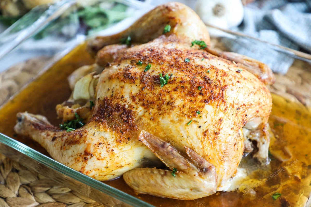Oven Baked Rotisserie Chicken made at home in a casserole dish.